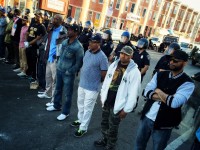 men-standing-police-line-baltimore